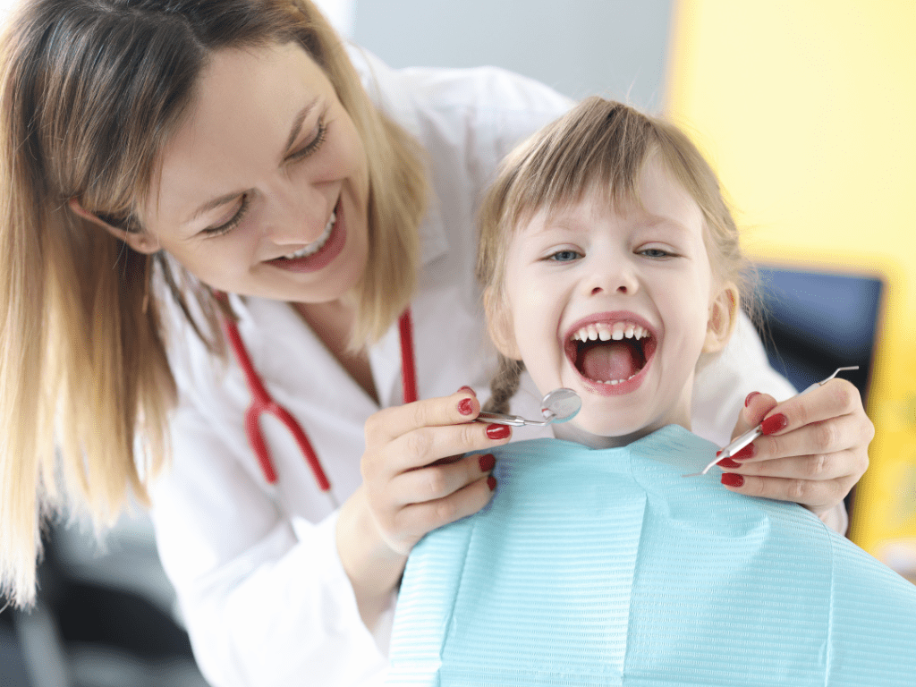 dentist female child big smile